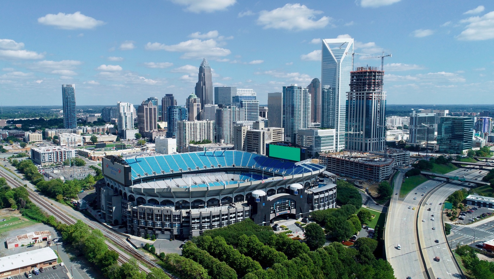 aerial view of Bank of America Stadium and the Uptown Charlotte skyline