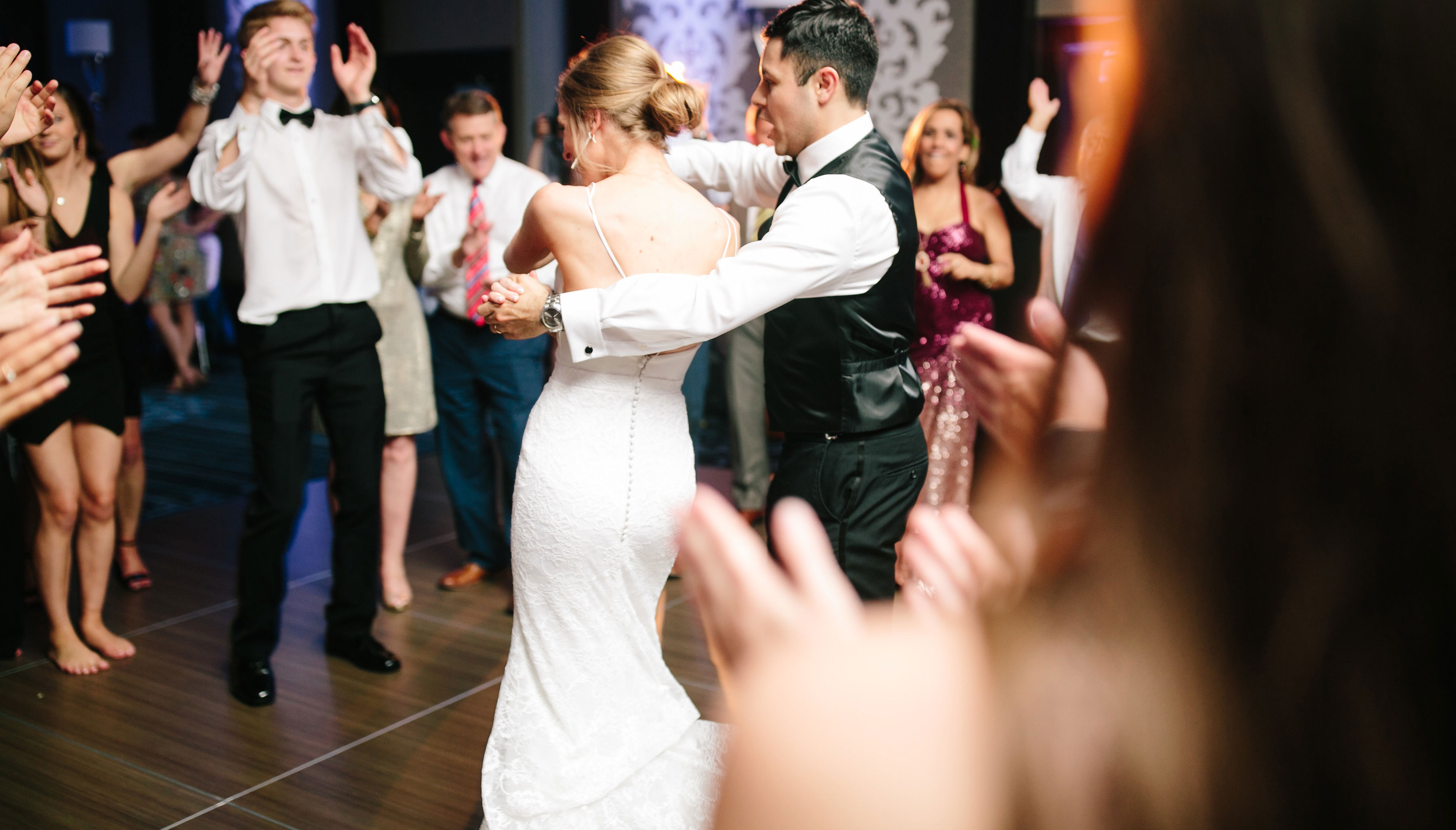 Newlyweds dancing at reception