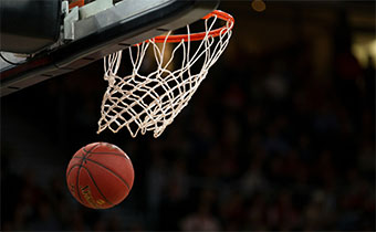 basketball going into hoop